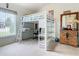 Bedroom with a loft bed, desk, and dresser at 204 Fox Loop, Davenport, FL 33837