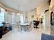 Eat-in kitchen with a breakfast nook and views of the backyard at 204 Fox Loop, Davenport, FL 33837