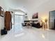 Bright living room with comfortable sectional sofa and large windows at 204 Fox Loop, Davenport, FL 33837