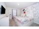 Bedroom with two twin beds featuring a Mickey Mouse mural at 2166 Fleming Mist Pl, Kissimmee, FL 34747