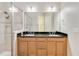Bathroom with double vanity and granite countertop at 2482 Yellow Brick Rd, St Cloud, FL 34772