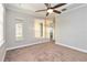 Spacious bedroom with carpeted floors and large windows at 2482 Yellow Brick Rd, St Cloud, FL 34772