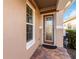Front entry with glass door and brick pavers at 2482 Yellow Brick Rd, St Cloud, FL 34772