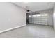 Attached garage with epoxy floor and automatic door at 2482 Yellow Brick Rd, St Cloud, FL 34772