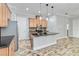 Modern kitchen features stainless steel appliances and granite countertops at 2482 Yellow Brick Rd, Saint Cloud, FL 34772