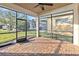Spacious screened-in porch with paver floor at 2482 Yellow Brick Rd, St Cloud, FL 34772