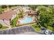 Community pool and surrounding buildings at 2602 Lemon Tree Ln # H, Orlando, FL 32839