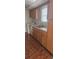 Kitchen with wood cabinets and tile floor at 2602 Lemon Tree Ln # H, Orlando, FL 32839