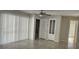 Living room with tile floors and sliding doors at 2602 Lemon Tree Ln # H, Orlando, FL 32839
