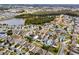 Wide aerial view of the neighborhood and surrounding area at 2620 Hunley Loop, Kissimmee, FL 34743