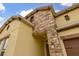 Close-up of a house's exterior, highlighting stone accents and architectural details at 3006 Princewood Dr, Minneola, FL 34715