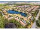 Large community view with lake and townhomes at 3083 Yellow Lantana Ln, Kissimmee, FL 34747