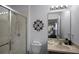 Clean bathroom with a shower, toilet, and vanity at 3083 Yellow Lantana Ln, Kissimmee, FL 34747