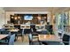 Community bar with seating and large screen TV at 3083 Yellow Lantana Ln, Kissimmee, FL 34747