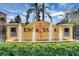 Encanta community entrance with fountain and signage at 3083 Yellow Lantana Ln, Kissimmee, FL 34747