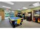 Community game room with air hockey, arcade games, and more at 3083 Yellow Lantana Ln, Kissimmee, FL 34747