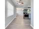 Bright dining area with gray walls and wood-look flooring at 309 Poinciana Cir, Kissimmee, FL 34744