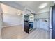 Open concept kitchen with stainless steel appliances at 309 Poinciana Cir, Kissimmee, FL 34744