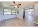 Sunroom with open view to kitchen and living areas at 309 Poinciana Cir, Kissimmee, FL 34744
