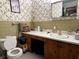 Retro bathroom with vintage tile, vanity, and shower/tub combo at 3800 Lavender Way, Casselberry, FL 32707