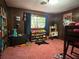 bedroom with colorful decor, toy storage, and playful elements at 3800 Lavender Way, Casselberry, FL 32707