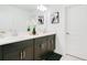 Elegant bathroom with double vanity and dark cabinets at 3989 Southern Vista Loop, Saint Cloud, FL 34772