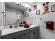 Mickey Mouse themed bathroom with double vanity at 4297 Paragraph Dr, Kissimmee, FL 34746