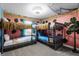Bedroom with bunk beds and tropical theme at 4297 Paragraph Dr, Kissimmee, FL 34746