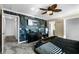 Main bedroom with a king-size bed, walk-in closet, and ensuite bathroom at 4297 Paragraph Dr, Kissimmee, FL 34746