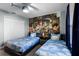 bedroom with twin beds and Toy Story mural at 4297 Paragraph Dr, Kissimmee, FL 34746