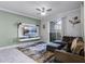 Gathering room with large TV and sliding doors to patio at 4297 Paragraph Dr, Kissimmee, FL 34746