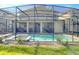 Inviting pool and spa with screened enclosure at 4633 Target Blvd, Kissimmee, FL 34746