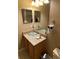Bathroom vanity with glass sink and granite countertop at 467 La Mirage St, Davenport, FL 33897