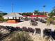 Poolside tiki bar with lounge chairs and tables at 467 La Mirage St, Davenport, FL 33897