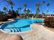 Large kidney-shaped pool with plenty of lounge space at 467 La Mirage St, Davenport, FL 33897