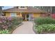 Landscaped walkway leading to community building at 5291 Images Cir # 104, Kissimmee, FL 34746