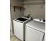 Laundry room with side-by-side washer and dryer at 7651 Sugar Bend Dr # 7651, Orlando, FL 32819