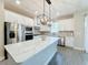 Modern kitchen with stainless steel appliances and island at 7959 Delwin Ln, Kissimmee, FL 34747