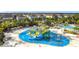 Aerial view of community waterpark with slides and splash pad at 7959 Delwin Ln, Kissimmee, FL 34747