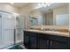 Bathroom boasts double sinks and a walk-in shower at 1577 Diamond Loop, Kissimmee, FL 34744