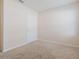 Empty bedroom with carpeted floor and a closet at 1577 Diamond Loop, Kissimmee, FL 34744