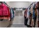 Walk-in closet with double hanging rods at 1577 Diamond Loop, Kissimmee, FL 34744