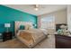 Spacious main bedroom with plush bed and large window at 1577 Diamond Loop, Kissimmee, FL 34744