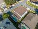 Bird's-eye view of the home, pool, and neighboring properties at 1079 Berkeley Dr, Kissimmee, FL 34744