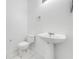 Clean bathroom with white fixtures and tile flooring at 1079 Berkeley Dr, Kissimmee, FL 34744