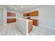 Kitchen with a breakfast bar, plenty of counter space, and stainless steel appliances at 1079 Berkeley Dr, Kissimmee, FL 34744