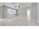 Spacious living room with tile flooring and ample natural light at 1079 Berkeley Dr, Kissimmee, FL 34744