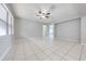 Bright living room with tile floors and a ceiling fan at 1079 Berkeley Dr, Kissimmee, FL 34744