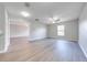Open living area with durable wood-look flooring, neutral colors, and abundant natural light at 1079 Berkeley Dr, Kissimmee, FL 34744
