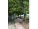 Brick paved back patio area with shed and lush landscaping at 116 S 4Th St, Haines City, FL 33844